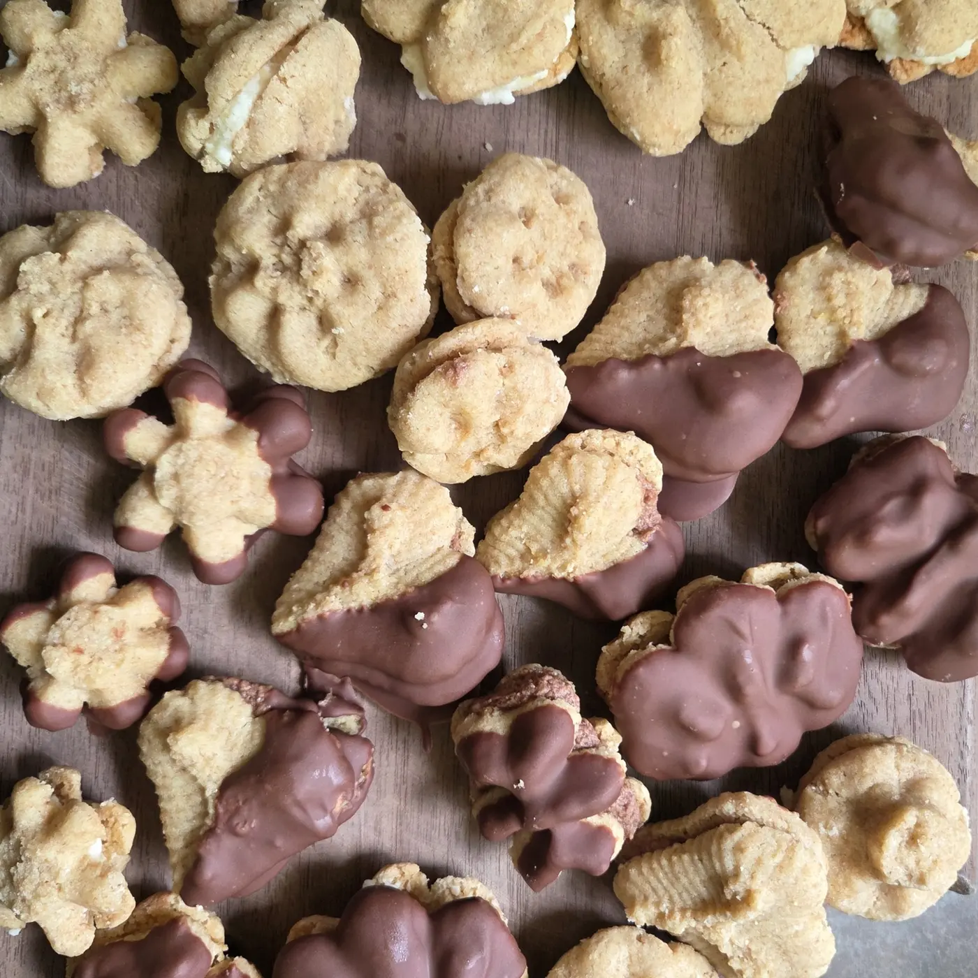 Homemade cookies, some dipped in chocolate
