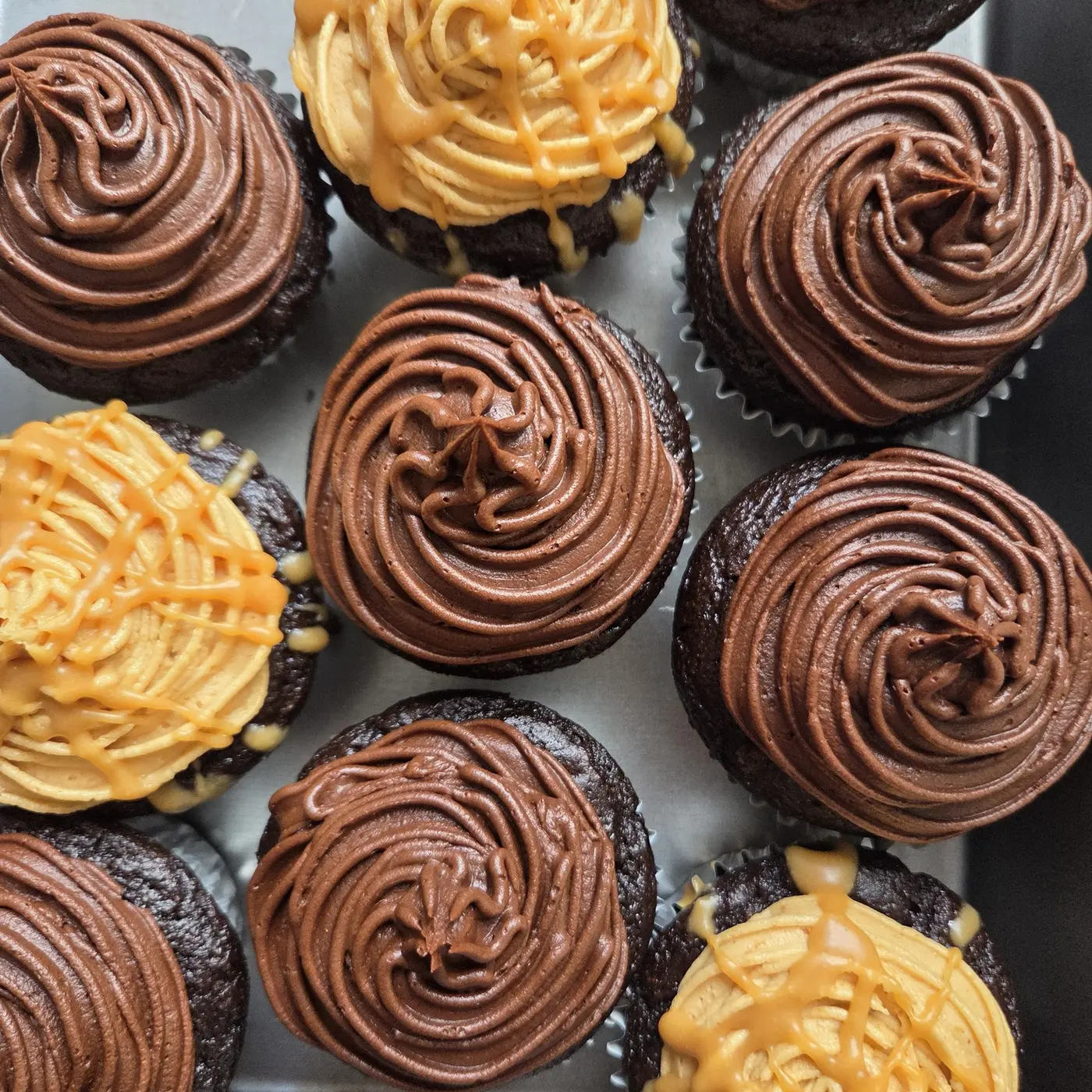 Assorted chocolate and caramel cupcakes