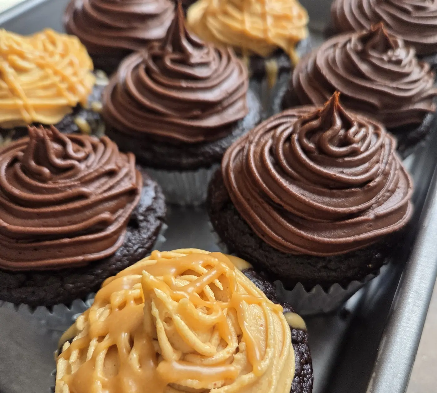 Chocolate cupcakes with chocolate and caramel frosting
