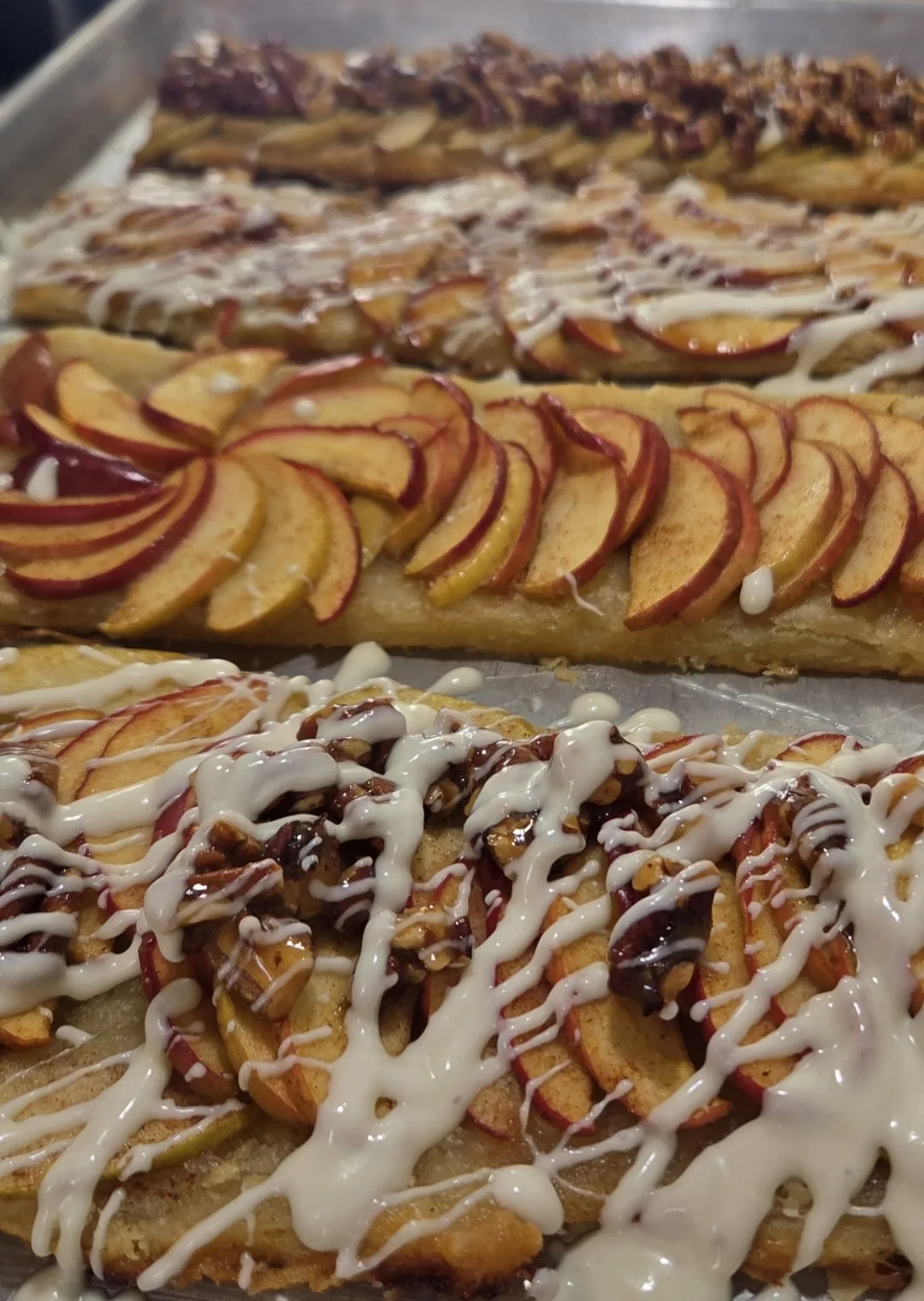 A close-up of a fruit pastry with a golden crust